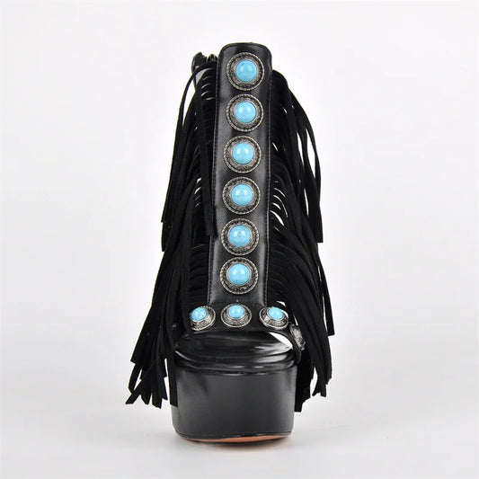 Front view of black fringe platform stiletto sandals with turquoise jewels