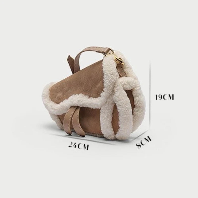 Shearling trim saddle bag with dimensions shown