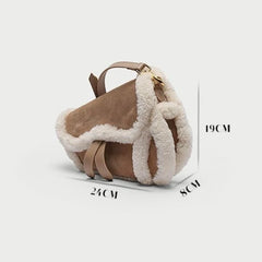 Shearling trim saddle bag with dimensions shown
