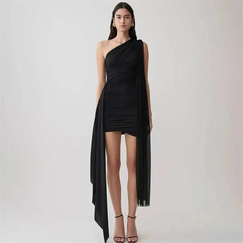 Full body shot of one-shoulder ruched mini dress in black
