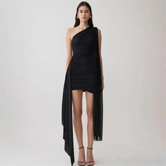 Full body shot of one-shoulder ruched mini dress in black