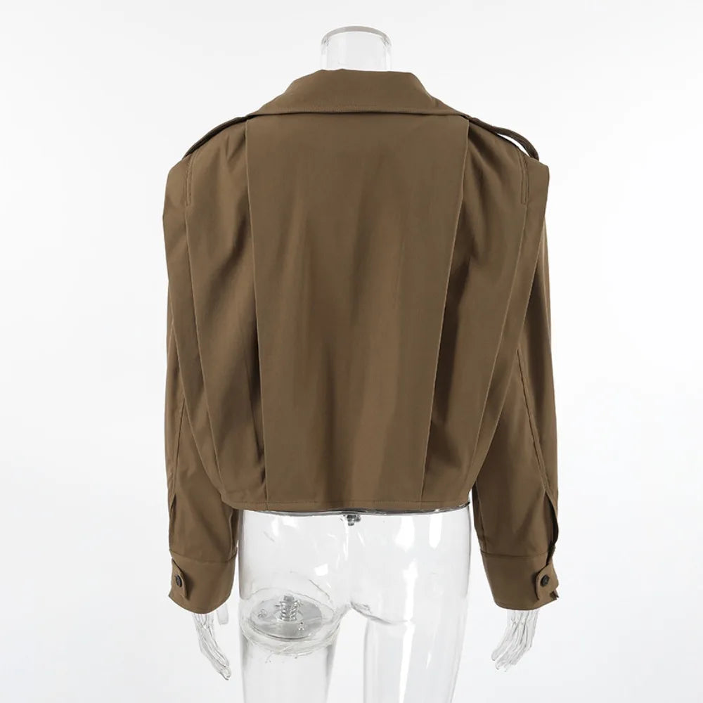 Brown jacket on a mannequin against a white background