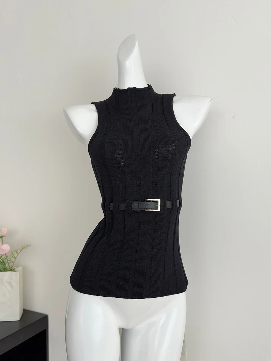 Black sleeveless top with a belt on a mannequin against a plain background