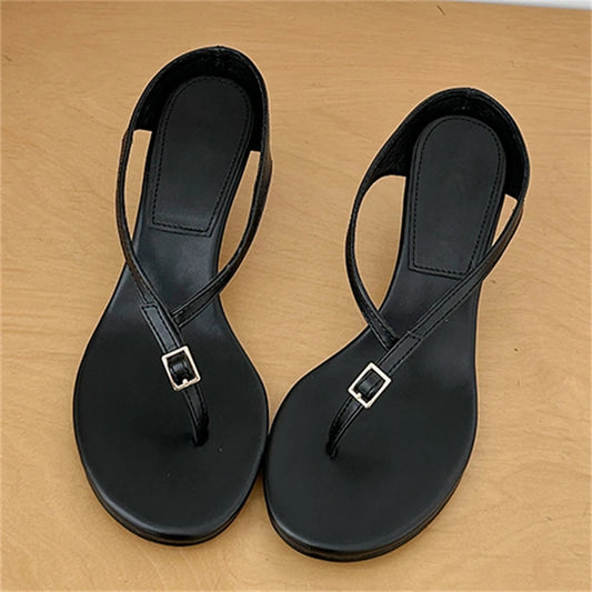 Black buckle strap wedge heel flip flops