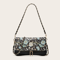 Black floral print chain shoulder bag with blue accents