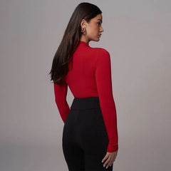 Women's hollowed out long sleeve bodysuit in black for spring 2025 fashion.