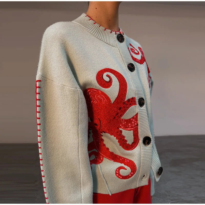 Detail of the octopus jacquard knit cardigan sleeve