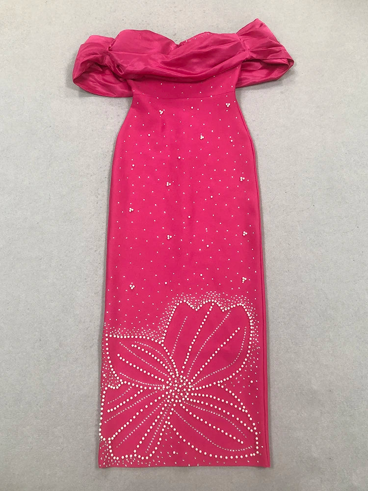 Pink off-shoulder dress with floral pattern on a gray background