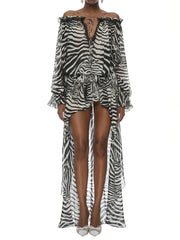 Full view of zebra print off shoulder top and high low skirt set