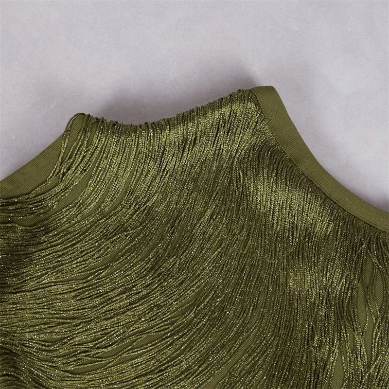 Close-up of a green textured fabric with a plain background