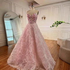 Pink strapless floral prom gown with beaded bodice and tulle court train