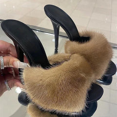 Brown fur slide heels with black sole and stiletto heel