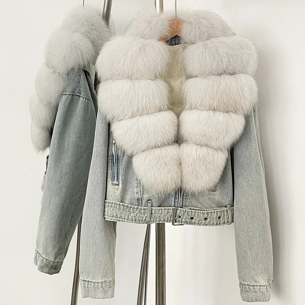 Denim jacket with white fur vest on a stand 