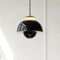 Close-up detail of the LED bulb and delicate flower bud shape of the pendant light. Black Golden Atelier 2