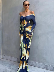 Cut-out floral print off-shoulder maxi dress worn by a model