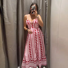 Close-up of the floral embroidery on the maxi dress.