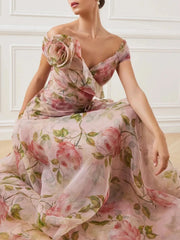 Woman wearing a floral dress with a white wall background