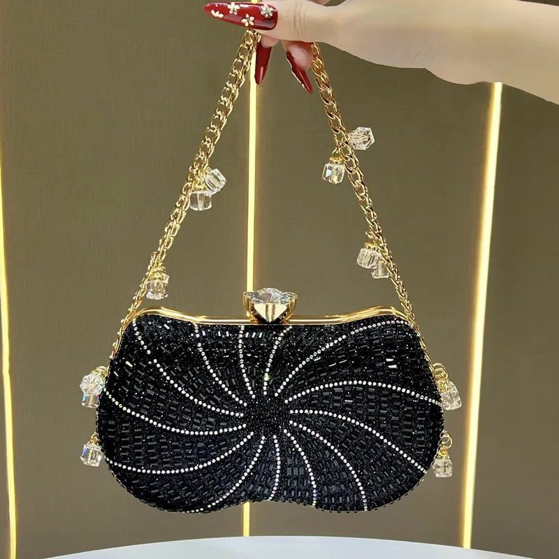 Black sunburst beaded clutch bag with crystal chain