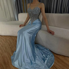 Blue satin beaded mermaid evening gown with sweetheart neckline and spaghetti straps
