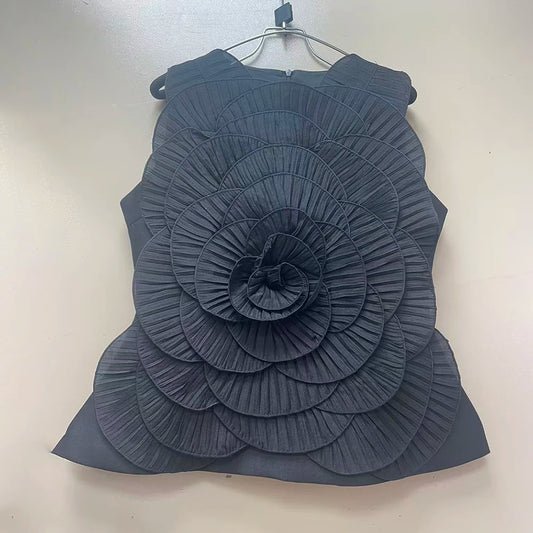 Dark gray top with a large floral design on a white background