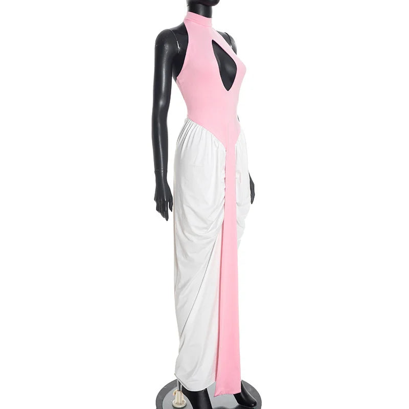 Mannequin wearing a pink and white dress on a white background