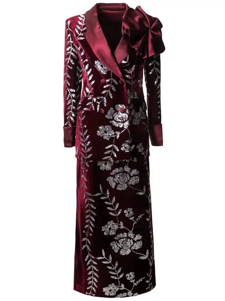 Full length view of burgundy sequined floral blazer and split skirt suit