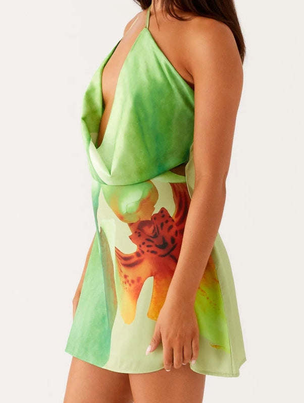 Green dress with a tiger design on a white background