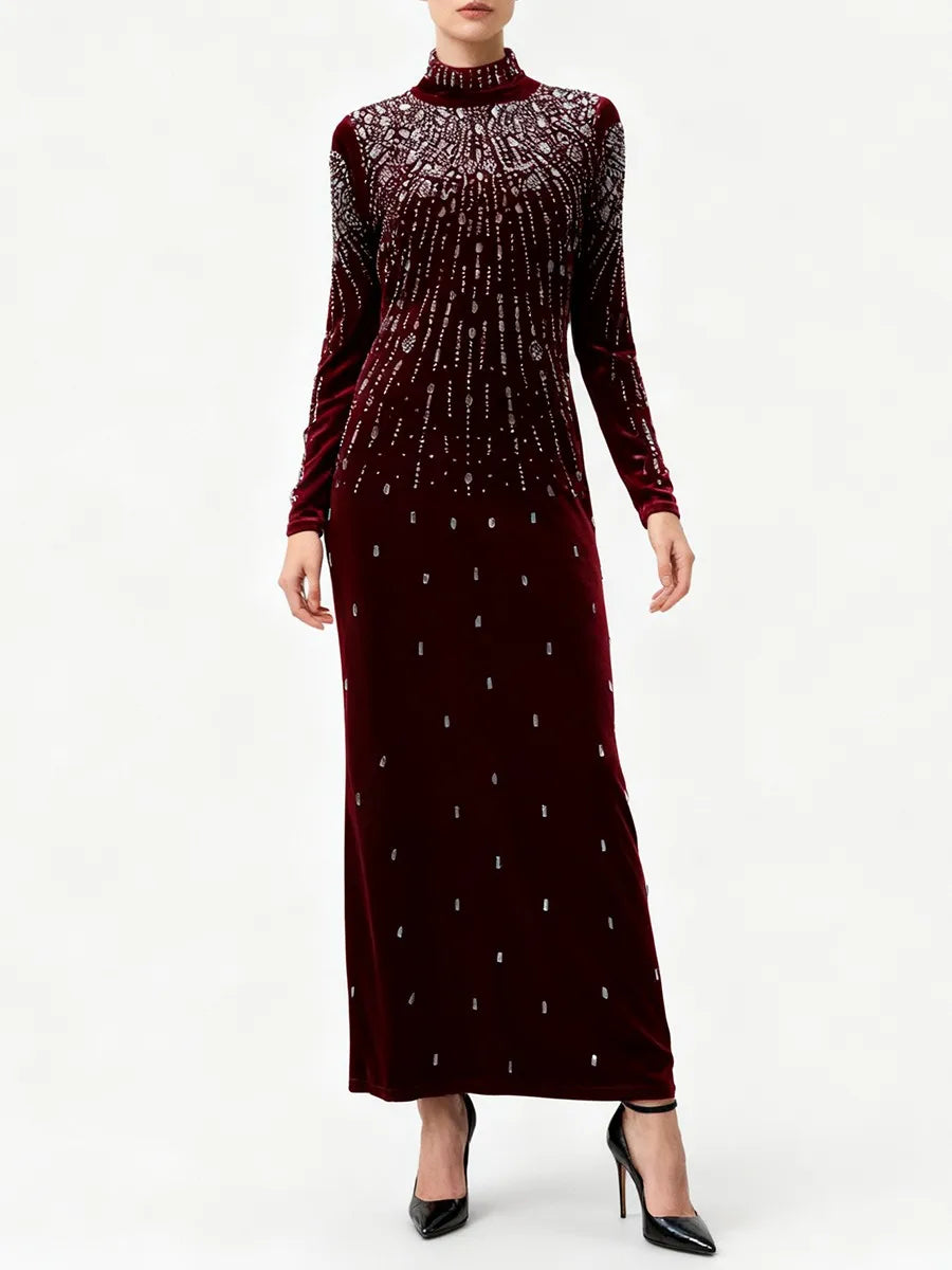 Elegant long sleeve embellished dress with refined detailing
