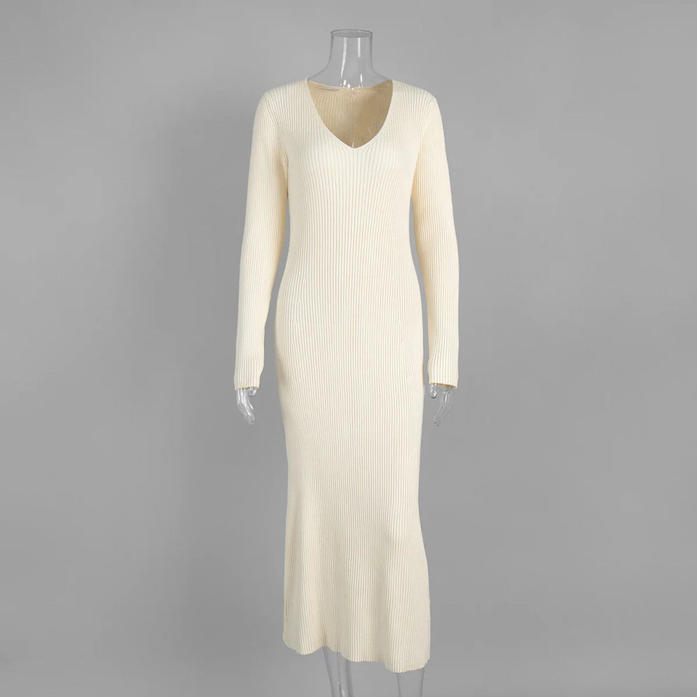 White ribbed dress on a mannequin against a gray background