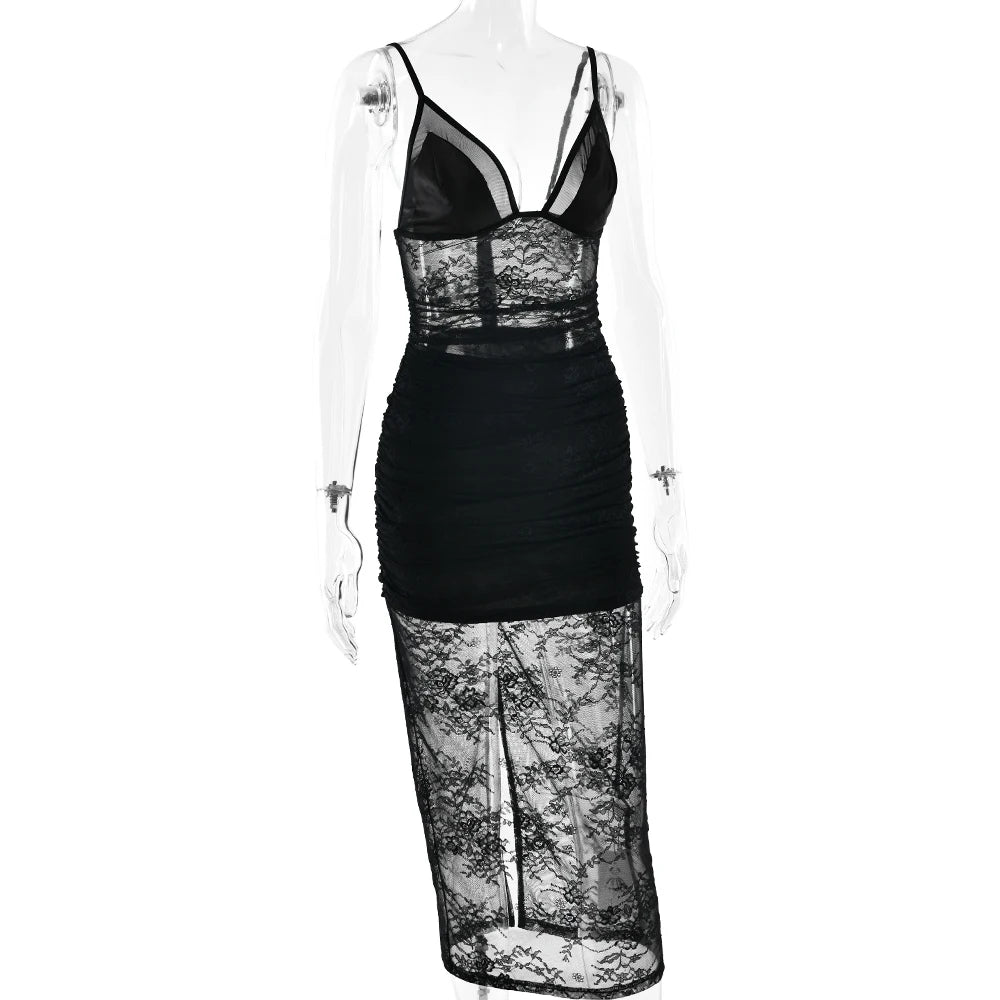 Black lace dress on a mannequin against a white background