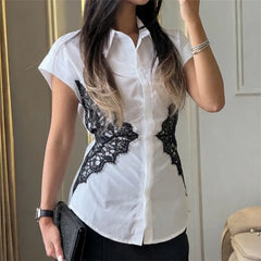 White button-down shirt with black lace panels from front
