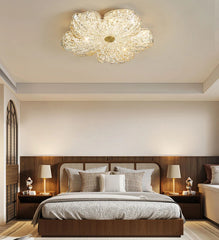 Gold flower-shaped LED ceiling light with resin petals for modern interiors.