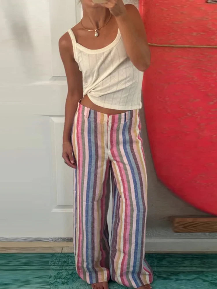 Striped wide leg trousers with a multicolor stripe pattern.
