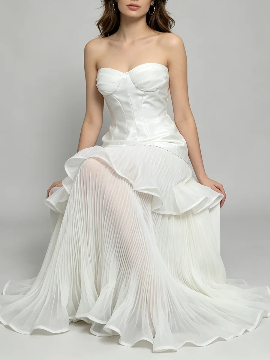 Strapless pleated ruffle gown sitting