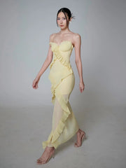 Model wearing ruffled spaghetti strap maxi dress