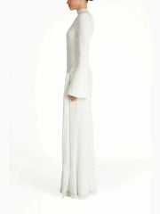 White dress with a high neckline and long sleeves on a white background