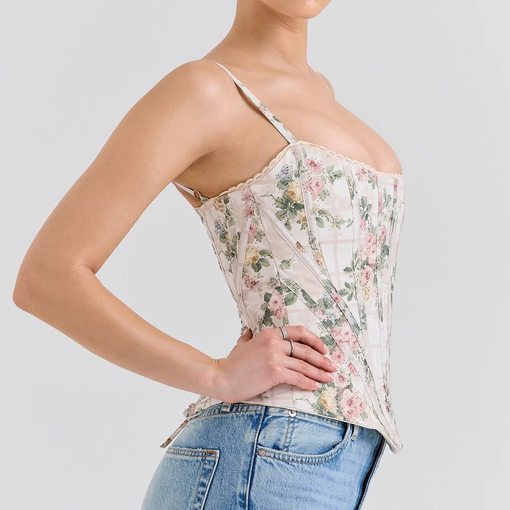 Floral corset top worn by a person on a plain background