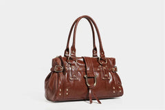 Brown structured shoulder bag with gold-tone hardware and lock charm, side view