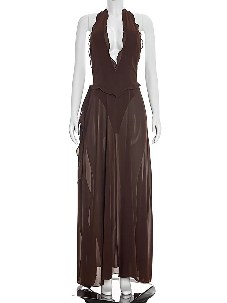 Brown evening gown on a white mannequin against a white background