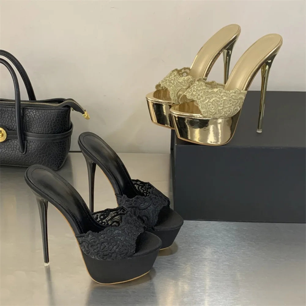 Black high-heeled shoes with lace detailing and gold high-heeled shoes on a reflective surface.