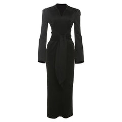 Black dress with long sleeves on a white background