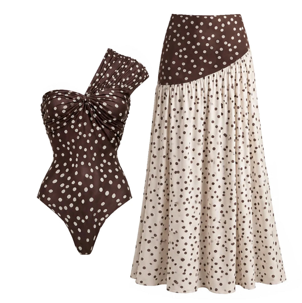 Polka dot one-piece swimsuit and flowing maxi skirt displayed together.