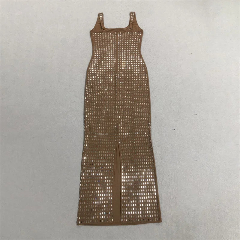 Full view of a long sleeveless dress with crystal embellishments