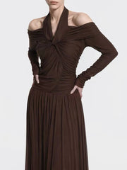 Close-up of the ruched bodice on a halter maxi dress
