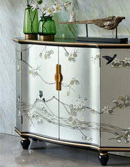 Decorative cabinet with floral design on a marble floor