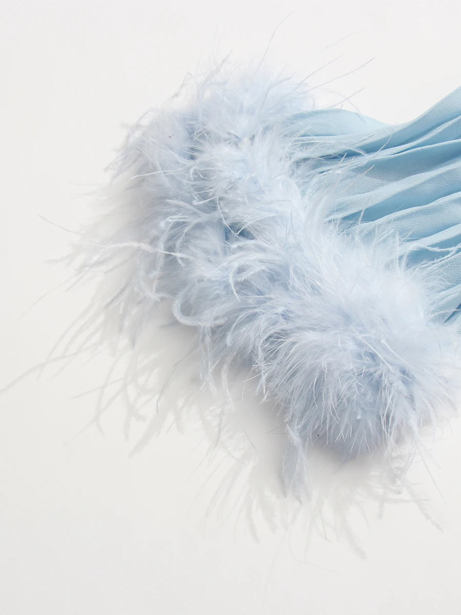 Light blue feathered fabric on a white background