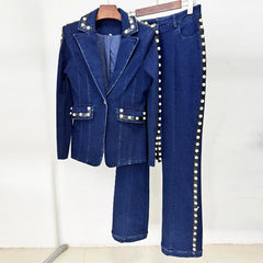 Beaded denim blazer and wide leg jeans suit on hangers.