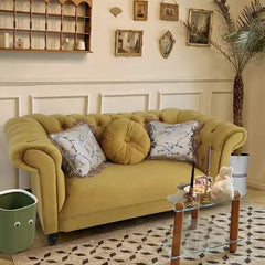 Triple-seater yellow sofa in art-style interior with patterned rug