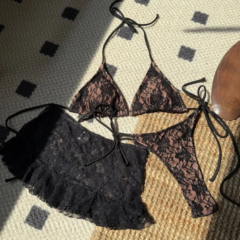 Black and beige lace bikini set laid flat
