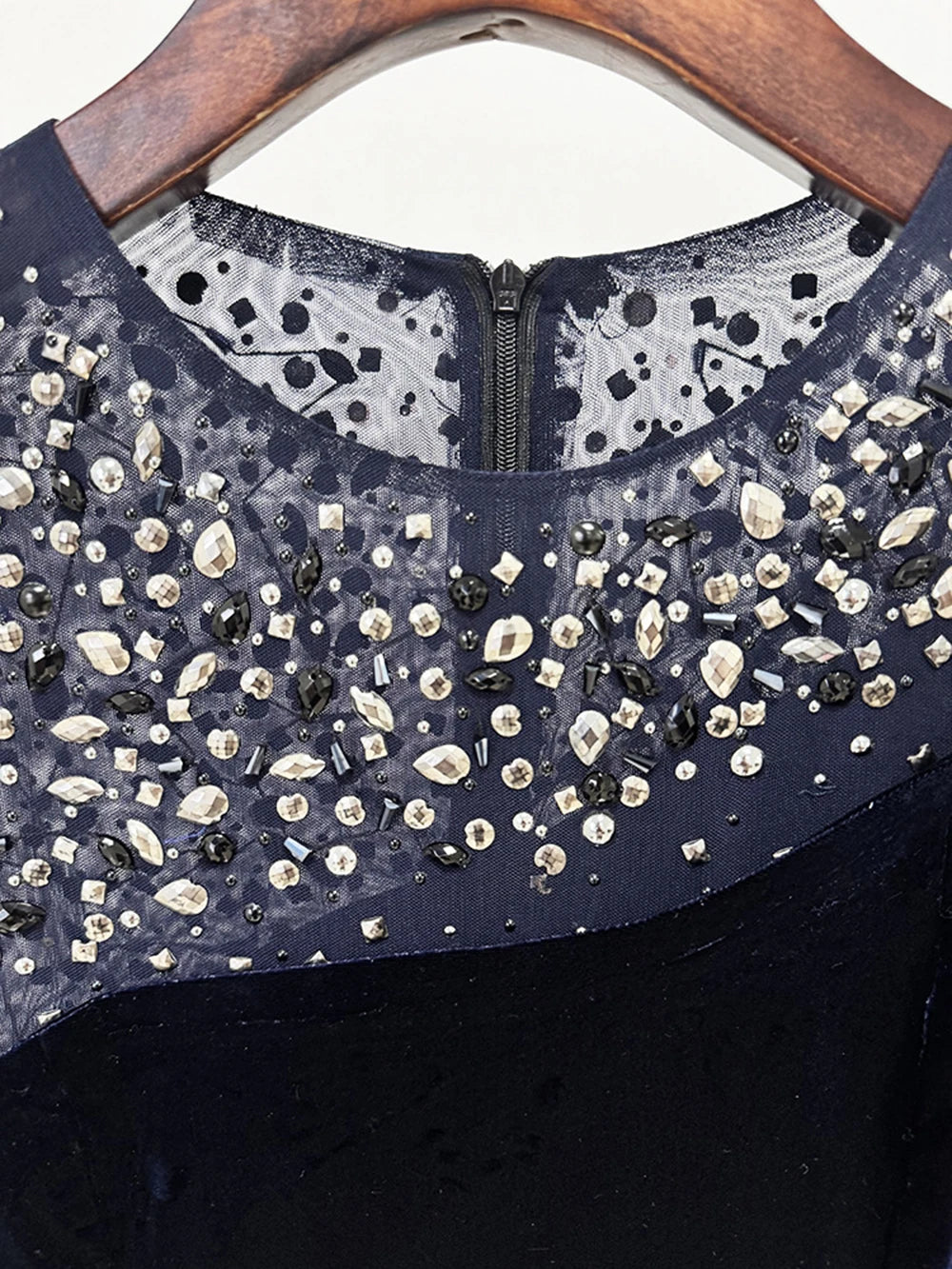 Sophisticated long gown with refined profile and beaded texture